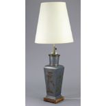 A 20th century Chinese silvered-metal table lamp of square form with applied floral decoration, 40’”