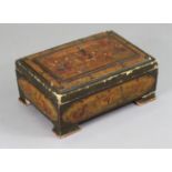 A 19th century Moroccan leather-covered rectangular work box with all-over polychrome decoration