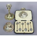 A Set of six Art Deco silver-gilt coffee spoons, the backs of the bowls with black & white enamel