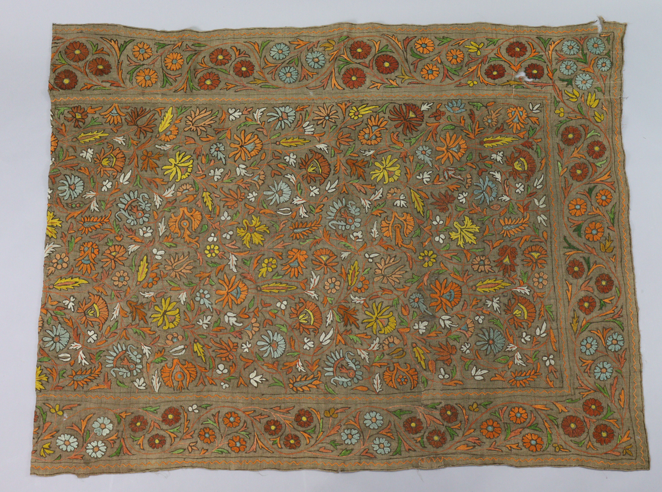 An early 20th century Indian crewelwork embroidered panel with multicoloured floral design, 5’5” x - Image 2 of 8