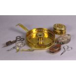 An early 19th century brass chamber candlestick with pierced gallery, 7" dia.; a pierced oval box