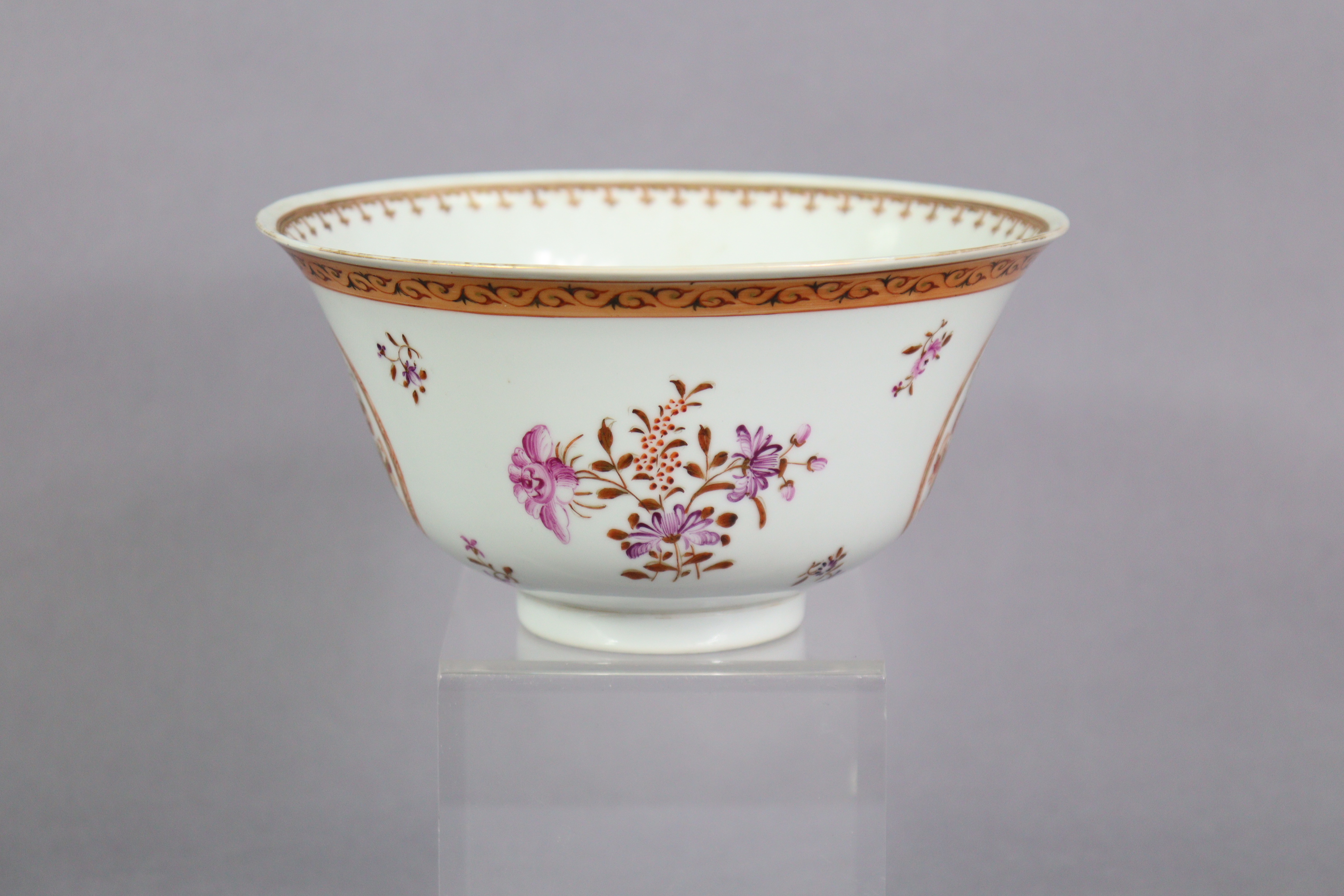 An 18th century Chinese export porcelain bowl with painted armorials in reserves, & floral sprays - Image 2 of 5