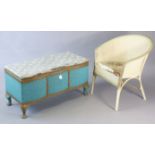 A pale blue & gold painted loom serpentine-front box ottoman with a hinged lift-lid, & on short