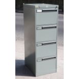 A Leabank grey art-metal four-drawer filing cabinet (with keys), 18” wide x 52” high x 24½” deep.
