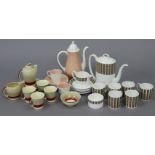 A Susie Cooper bone china “Saturn” fifteen-piece coffee service; & two Susie Cooper part coffee