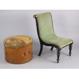 An early 20th century ebonised wooden-frame nursing chair upholstered pale blue velour, & on short