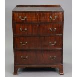A reproduction mahogany bow-front chest fitted four long graduated drawers with brass swan-neck