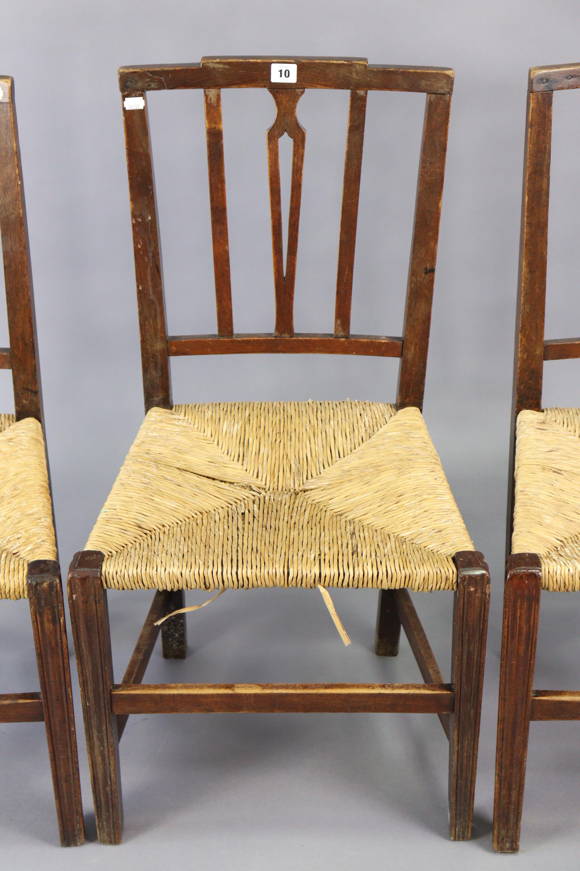 A set of three early 20th century splat-back dining chairs each with a woven-rush seat, & on - Image 2 of 10