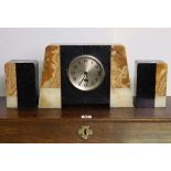 An Art Deco black slate & marble clock garniture comprising of mantle clock, 8¼” high; & a pair of
