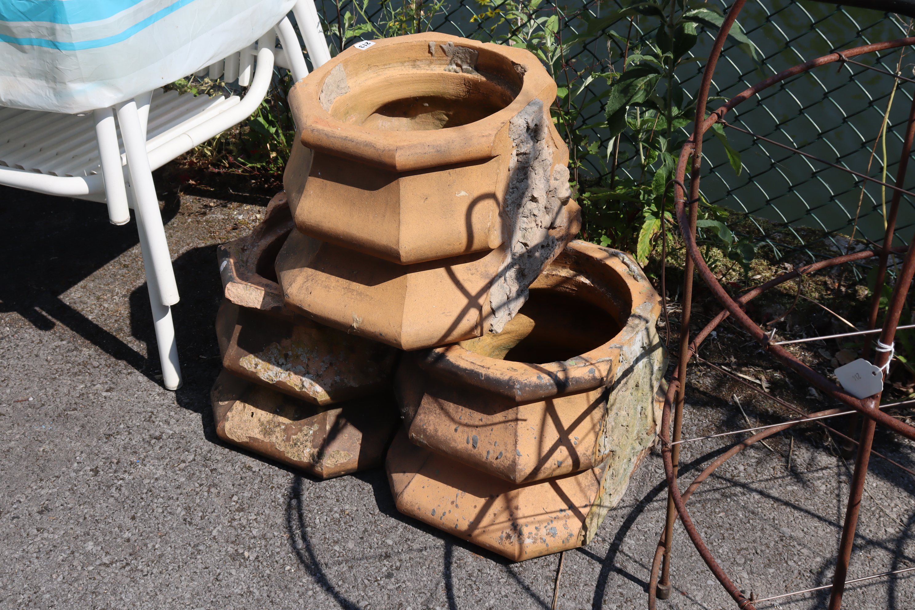 Three terracotta chimney-pot sections each 20” wide x 12½” high; & a set of four white-metal - Image 3 of 4