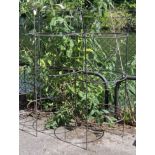 A similar pair of wrought-iron three-tier garden plant frames, 24½” diameter x 60¾” high.