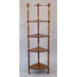 A beech tall five-tier corner whatnot with turned supports, 19” wide x 61” high x 13¾” deep.