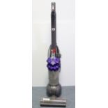 A Dyson “DC50” upright vacuum cleaner.