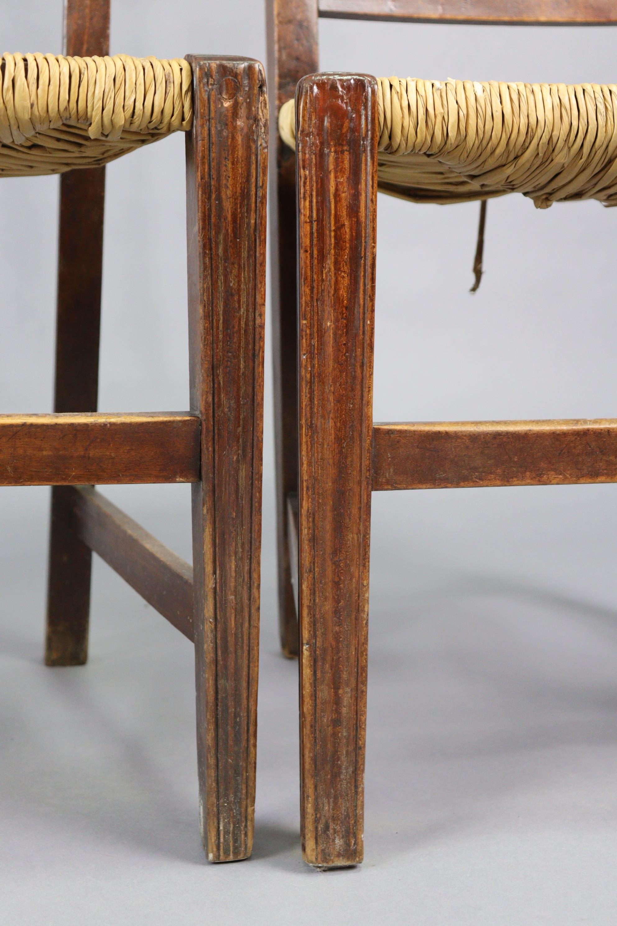 A set of three early 20th century splat-back dining chairs each with a woven-rush seat, & on - Image 6 of 10