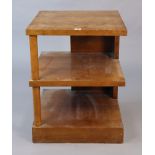 A mahogany square three-tier book table on a plinth base, 19½” wide x 25” high; & a rectangular wall