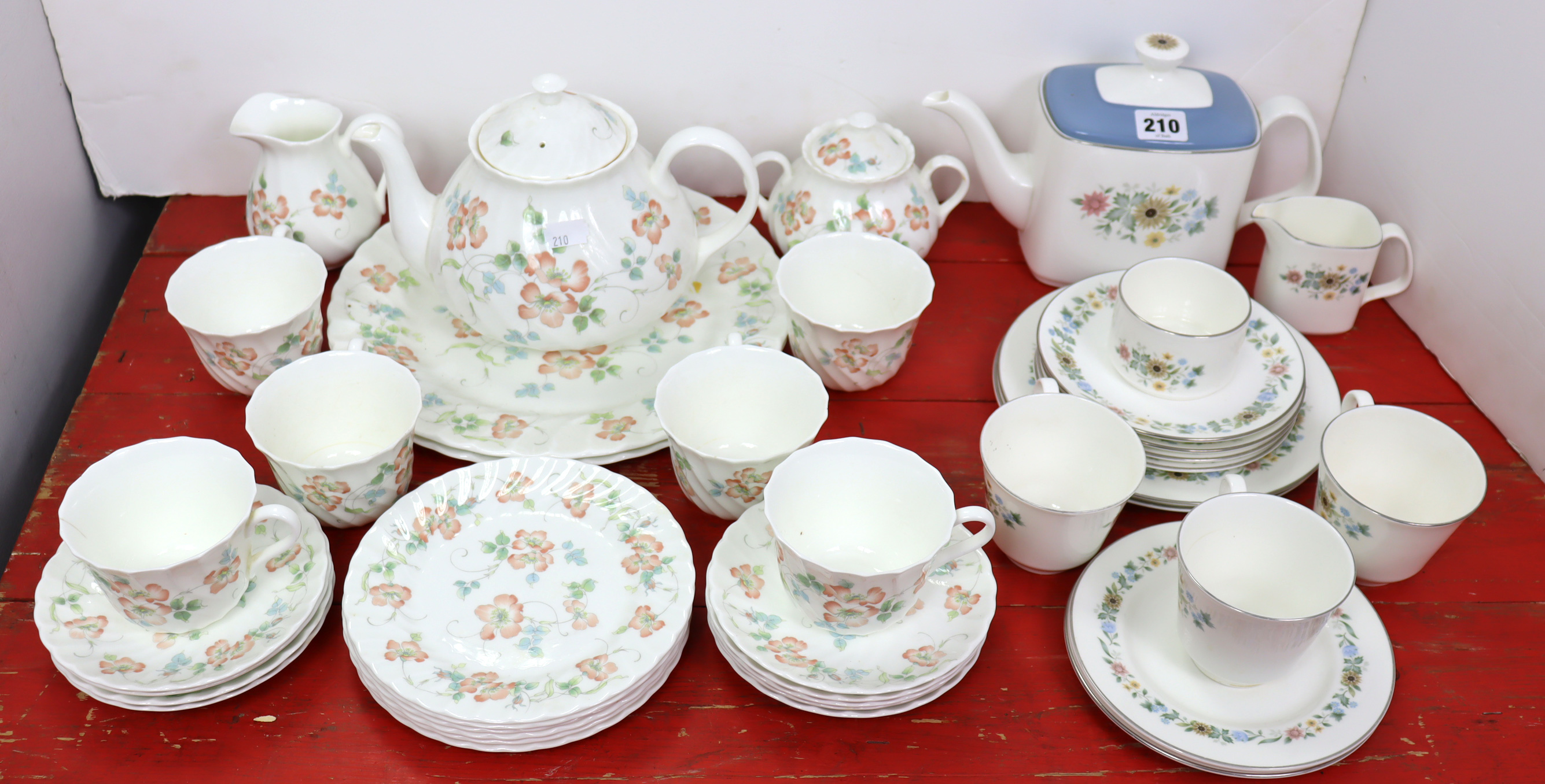 A Wedgwood bone china “Cottage Rose” twenty-six piece part tea service; & a Royal Doulton “