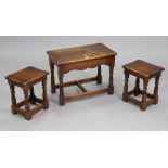 An oak nest of three occasional tables (two under one) each table on four baluster-turned legs