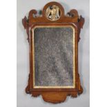 A 19th century mahogany fret-carved rectangular wall mirror with pierced gilt Ho-Ho bird surmount,