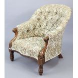 A Victorian carved walnut-frame buttoned-back easy chair upholstered multi-coloured floral material,