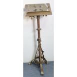 A late 19th/early 20th century brass lectern with a pierced & engraved rectangular top, on a