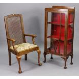 A mid-20th century mahogany small china display cabinet fitted two shelves enclosed by a glazed door