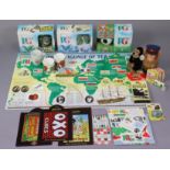 A collection of P.G. Tips merchandise including three mugs; six sets of playing cards; a money-