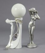 An art deco-style silvered composition standing nude female figure, 15¾” high; & an art deco-style