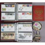 A collection of approx. 100 GB First Day covers, 1980-2002, in two albums; a small stamp album & con