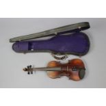 A Czechoslovakian violin, circa 1930s, 23¼” long, with fibre-covered case.