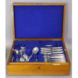 An oak canteen & contents of silver-plated Old English & other flatware & cutlery.
