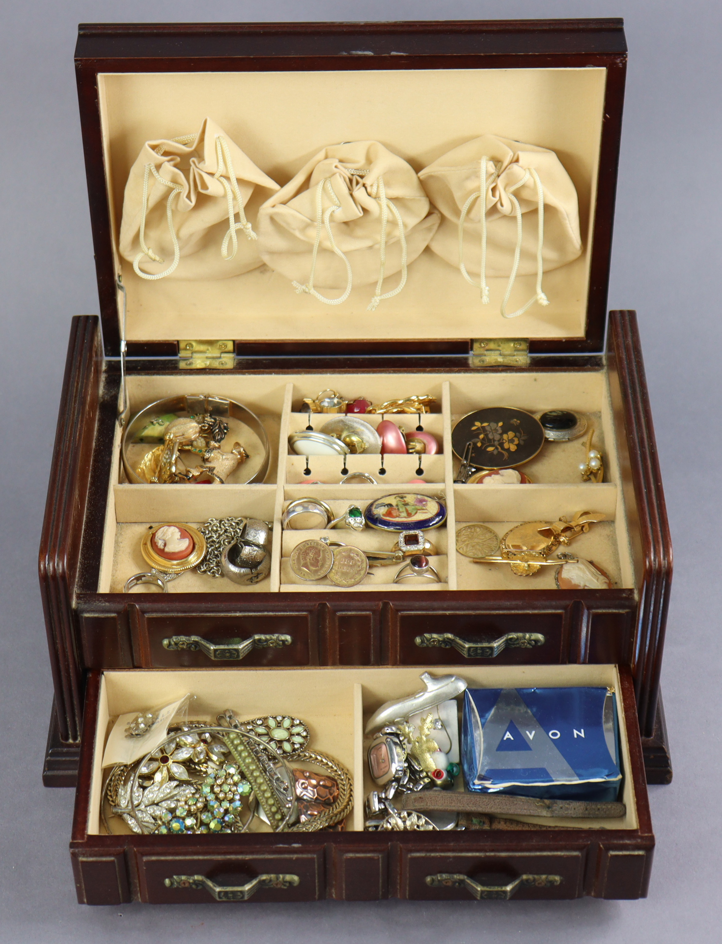 Various items of costume jewellery; & a mahogany-finish jewellery box.