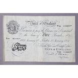 A Bank of England white £5 note dated 17th Jan 1951, P.S. Beale Chief Cashier, serial No. 009957.