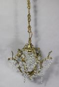 A bronzed five-Branch ceiling light fitting hung with cut-glass prism drops & strands-of-beads,
