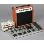 A Tone Works Korg “AX1500G” modelling signal processor; & orange “Micro Terror” amplifier; & a
