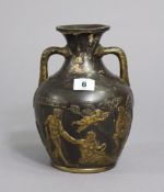 A pottery copy of the Portland vase with classical figures in relief, 8¾” high.