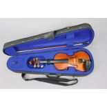 A Czechoslovakian violin, circa 1950s(?); a Stentor “Student I” violin 23¼” long, each with case;