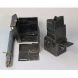 A vintage Pressman’s popular box plate camera with six plates, case, & tripod.