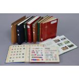 A collection of Greek stamps in three albums; two albums of GB Commonwealth; another of Royal Mail