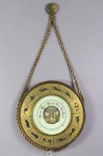 A mid-20th century wall barometer in a wooden case, & with Signs of the Zodiac motifs to border,