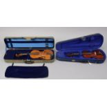 A Stentor “Student I” violin, 23¼” long; & another violin 23¾” long, each with case.