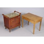 An Edwardian piano-stool with a padded seat, & with a fall front, 21½” wide; together with two