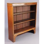 A Victorian mahogany standing open bookcase with two adjustable shelves, & on bracket feet, 42¾” x