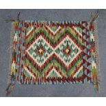 A Chobi kilim small mat with multicoloured double-lozenge motif in geometric borders, 60cm x 48cm.