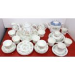 A Wedgwood bone china “Cottage Rose” twenty-six piece part tea service; & a Royal Doulton “