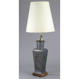 A Chinese silvered-metal table lamp of square form with applied floral decoration, 40’” high over-