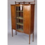 An Edwardian Art Nouveau inlaid-mahogany tall break-front china display cabinet fitted three shelves