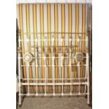 An Edwardian-style brass & white painted iron double bedstead, inset two bevelled-glass roundels