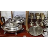 A pair of silver plated oval entrée dishes each with a detachable ring handle, having a beaded edge,