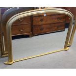 A gilt frame overmantel mirror with a rounded top, 32” wide x 43½” high.