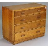 A light oak chest fitted four long graduated drawers with block handles, & on a plinth base, 36”